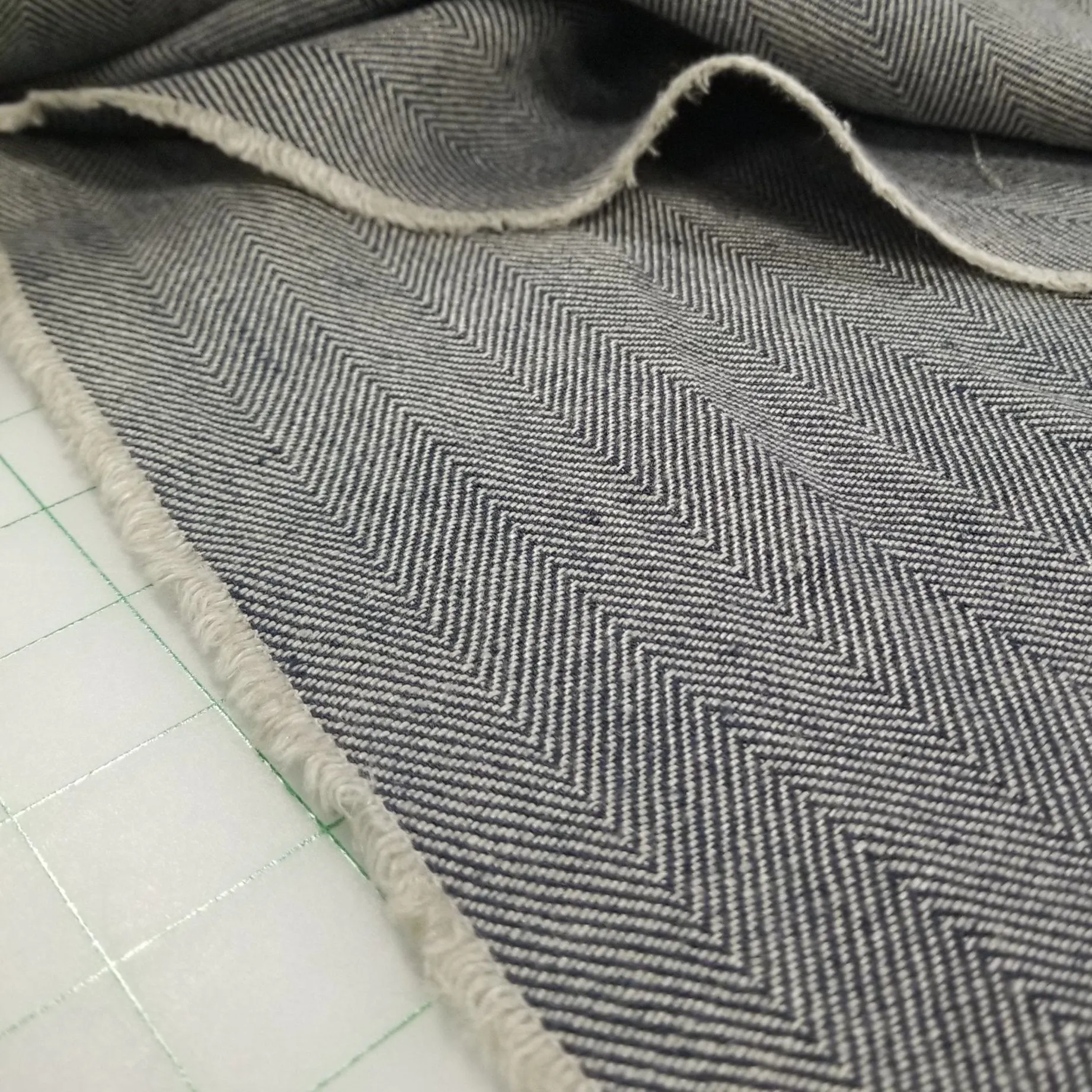 ENd of Bolt: 1-5/8th yards of Irish Pure Linen Dark Navy Herringbone Bottomweight Spence Bryson Woven 300 GSM-remnant