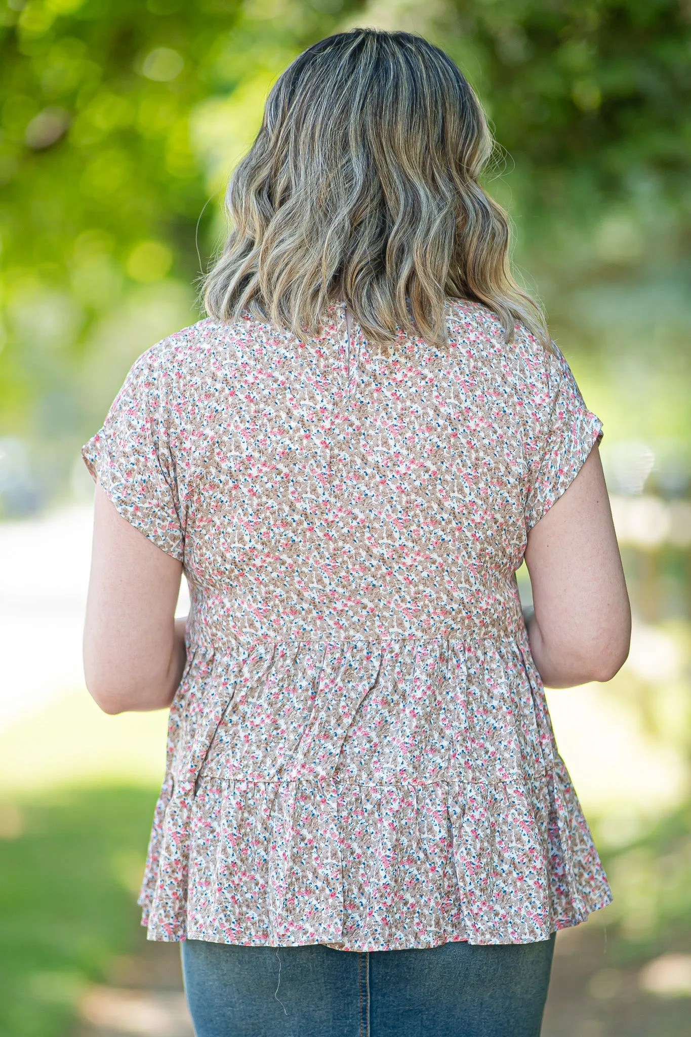 The Abby Tiered Baby Doll Blouse in Ditsy Floral