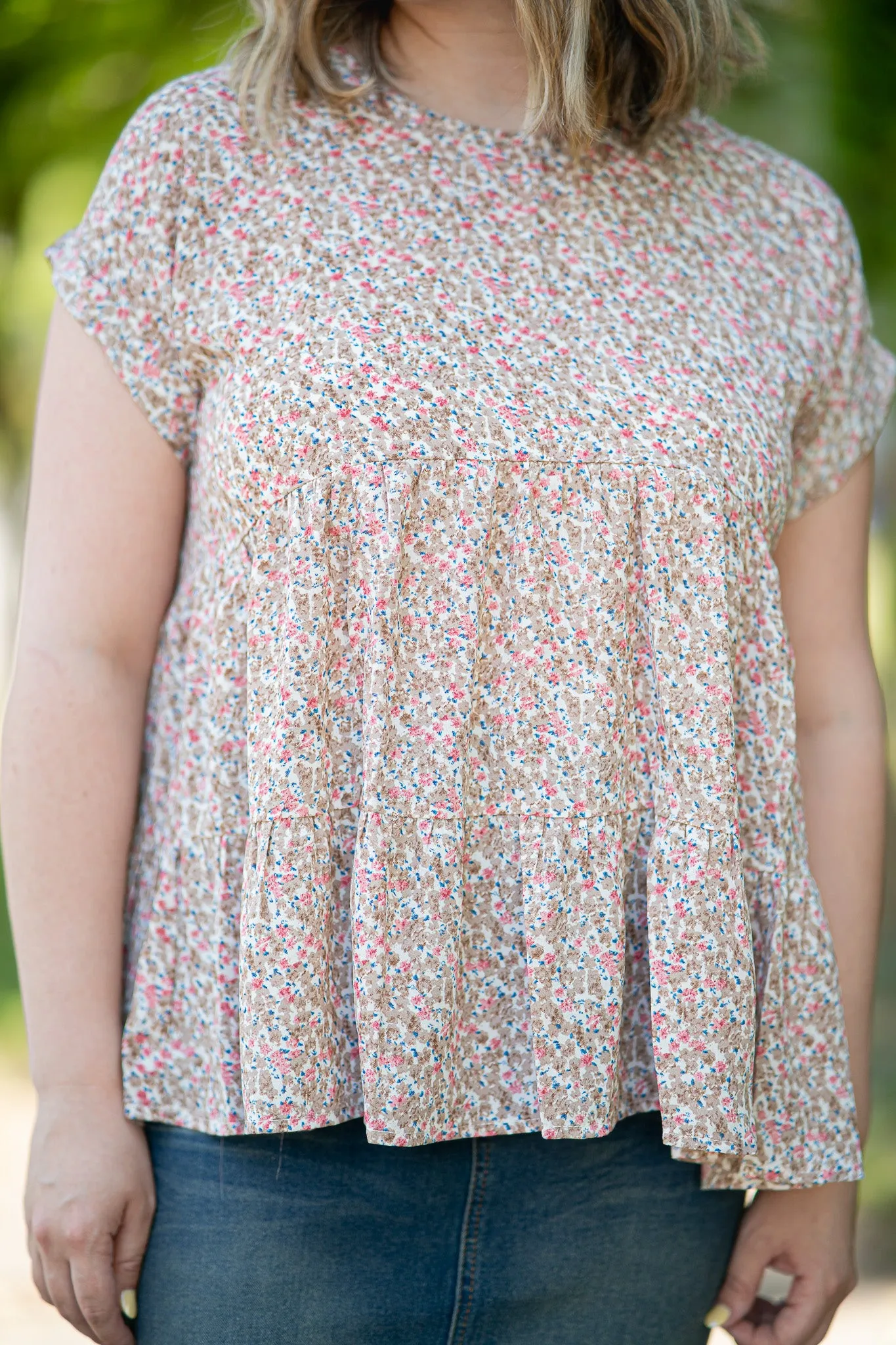 The Abby Tiered Baby Doll Blouse in Ditsy Floral